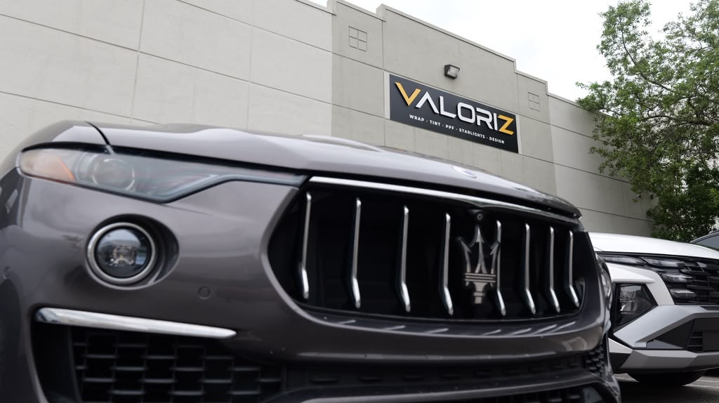 Vehicle detail outside the Valoriz studio.